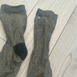 NWOT LULULEMON black shimmer logo socks.
